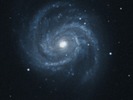 DSS-foto van het sterrenstelsel M100