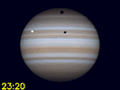 Io, Io's schaduw en Ganymedes' schaduw gelijktijdig te zien op Jupiters schijf