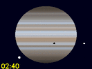 Io's schaduw en Ganymedes gelijktijdig zichtbaar op Jupiters schijf