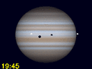 Io, Io's schaduw en Ganymedes' schaduw gelijktijdig te zien op Jupiters schijf
