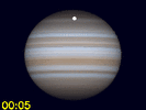 Io's schaduw en Ganymedes gelijktijdig te zien op Jupiters schijf