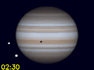 Io, Io's schaduw en Ganymedes gelijktijdig zichtbaar op de schijf van Jupiter